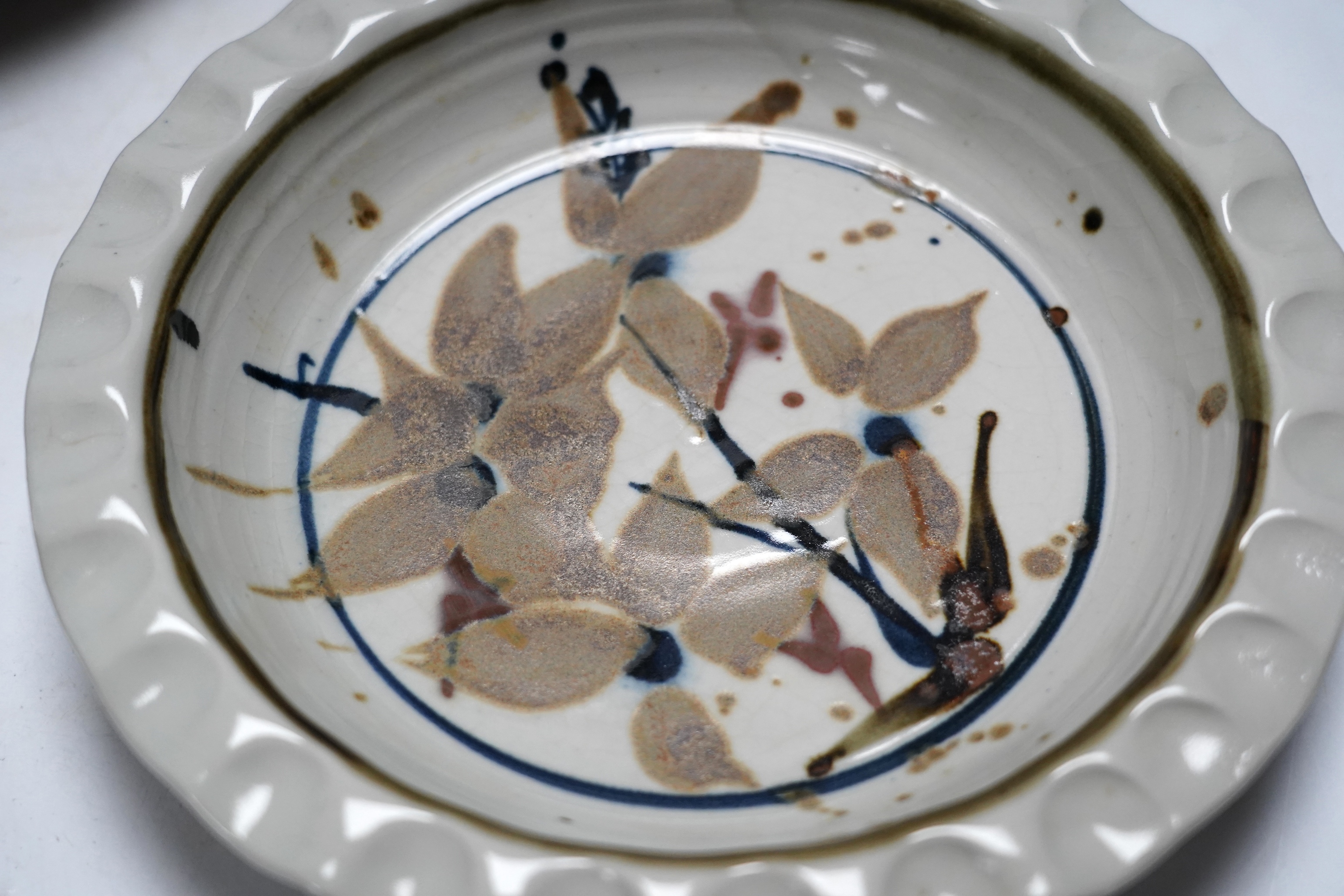A Raku ware pottery vase, a Leiard dish, a dish and a grey glazed vase, Raku vase 17.5cm high